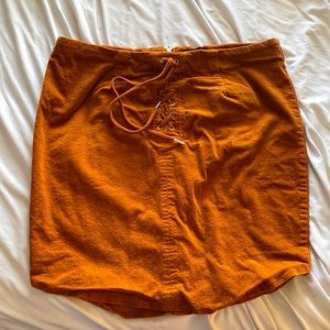 Corduroy burnt orange skirt with laced up front design